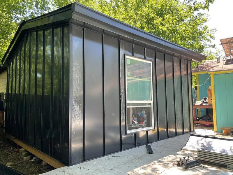 Black standing seam metal wall panels for Metal Roof Installation in Mission Bend